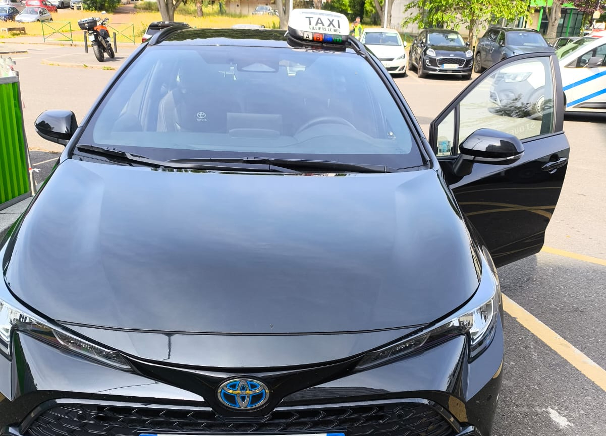 Taxi Toyota Corolla TS noire